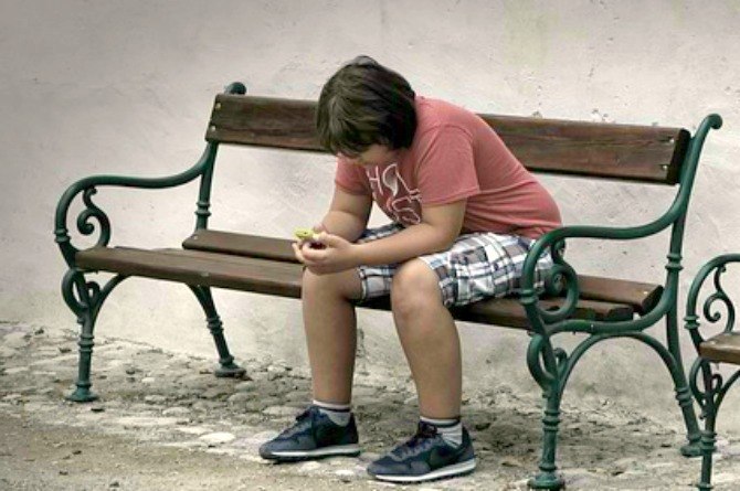 dangerous children's game, boy, sad, phone, alone, depressed, bullied